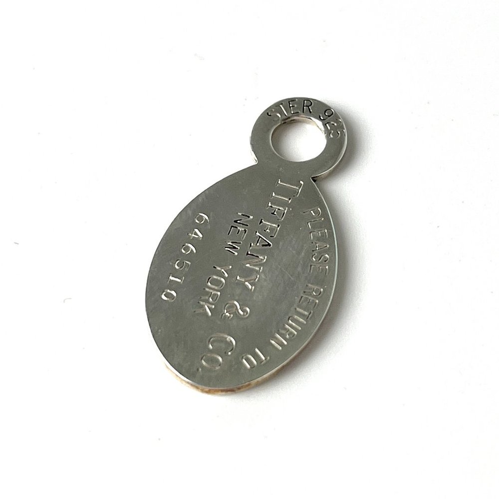 Authentic Tiffany & Co Oval Sterling Silver Return To Tag Charm Pendant